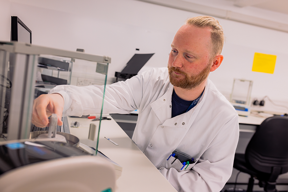 Scientist coducting a hair drug test